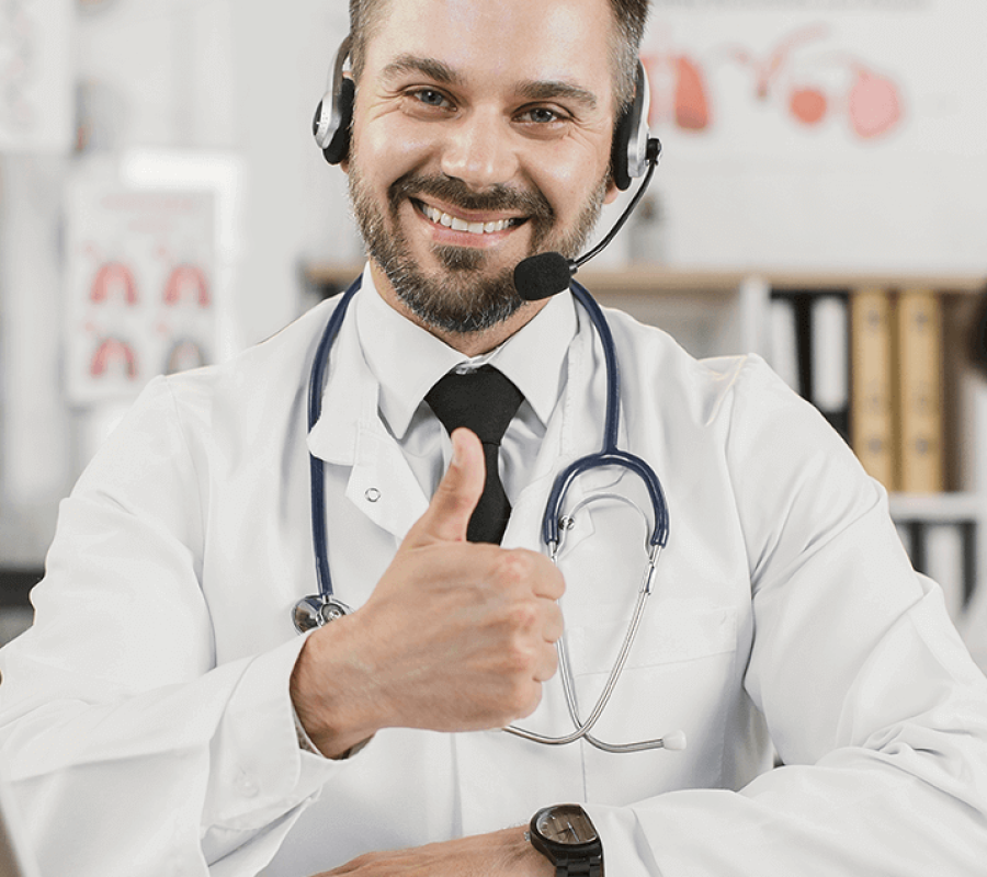 doctor-in-headset-having-video-call-on-laptop-2022-04-27-03-32-39-utc-1-1.png